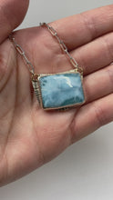 Load and play video in Gallery viewer, video of handcrafted sterling silver rectangle  larimar  pendant wtih sterling silver paperclip chain

