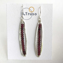 Load image into Gallery viewer, handcrafted sterling silver earrings long ovals faceted garnet on display card
