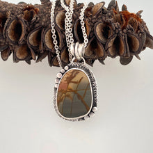 Load image into Gallery viewer, unique handcrafted sterling silver setting around a red creek jasper cabochon made by beth truso
