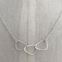 Load image into Gallery viewer, sterling silver linked triangle charm necklace cable chain on display
