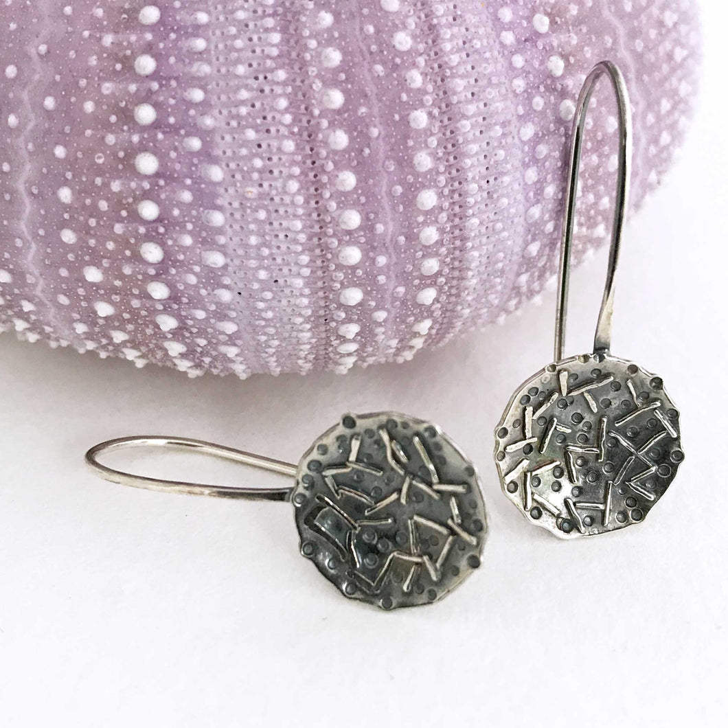 hand crafted round sterling silver earrings with fused wire and stamped embellishments antique finish